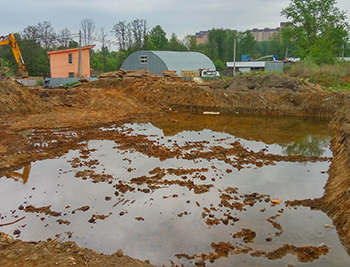 Откачка воды с участка Леоново